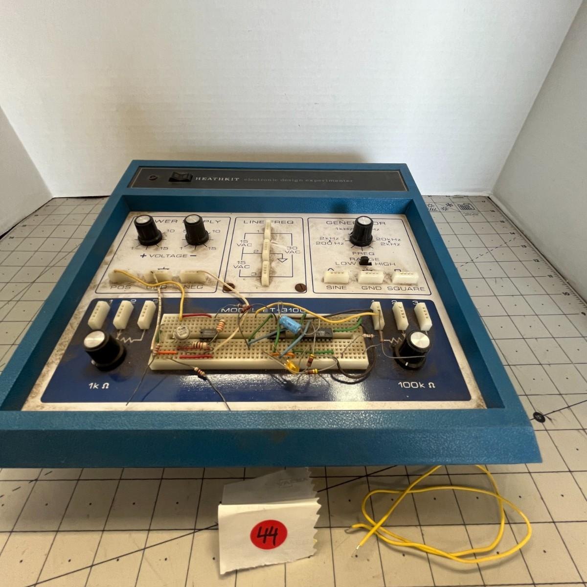 Figure 1 — A typical find: an original blue ET-3100 as it came out of a house sale, dusty, with a partly built circuit and loose hook-up wire still on the socket.