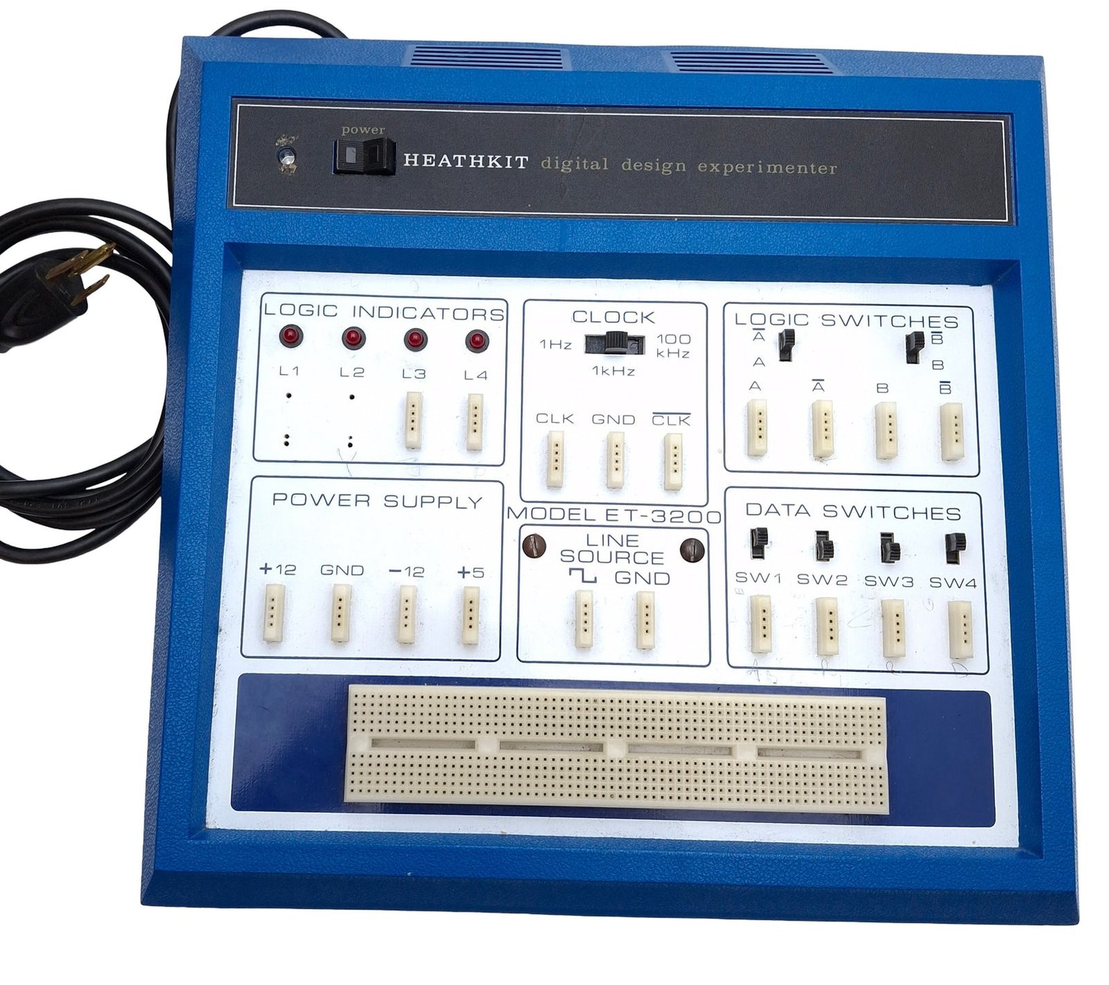 Figure 10 — An ET-3200A in the original blue cabinet with a white panel, photographed for a surplus sale. The panel still reads "Model ET-3200"; only the identification label on the bottom carries the A suffix…