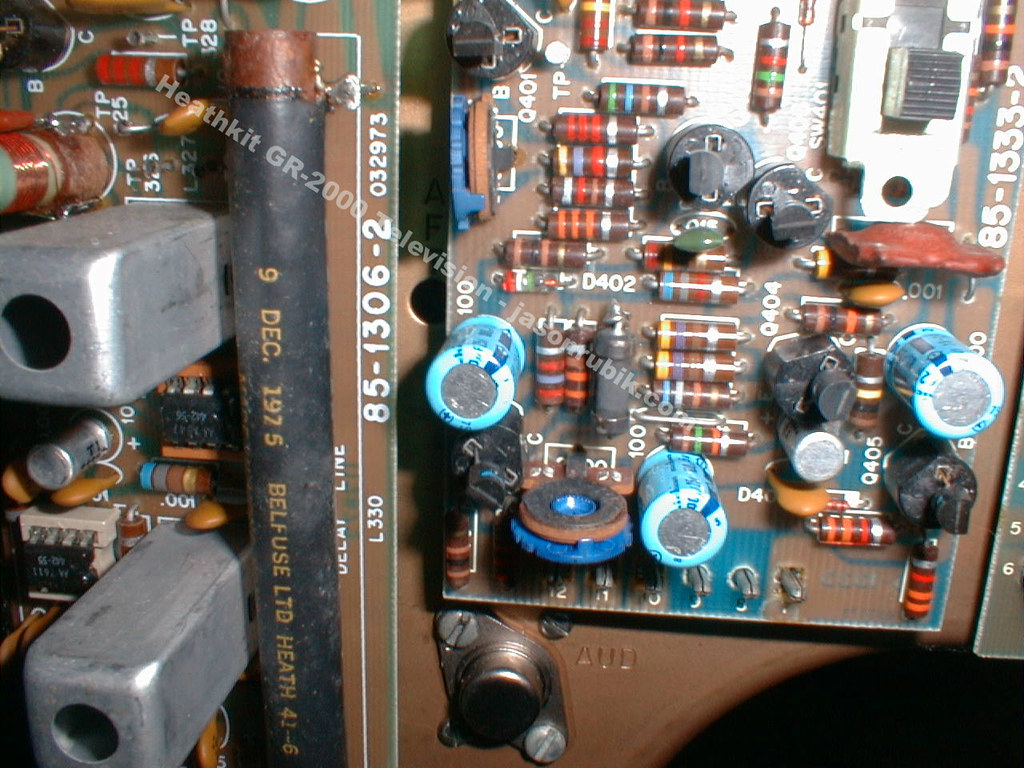 Figure 9 — Boards carry date codes: this one is marked 85-1306-2 and its fuse-holder is stamped DEC 1975. Dated parts are the best evidence of when a kit was bought and built, since Heath did not serialise ki…
