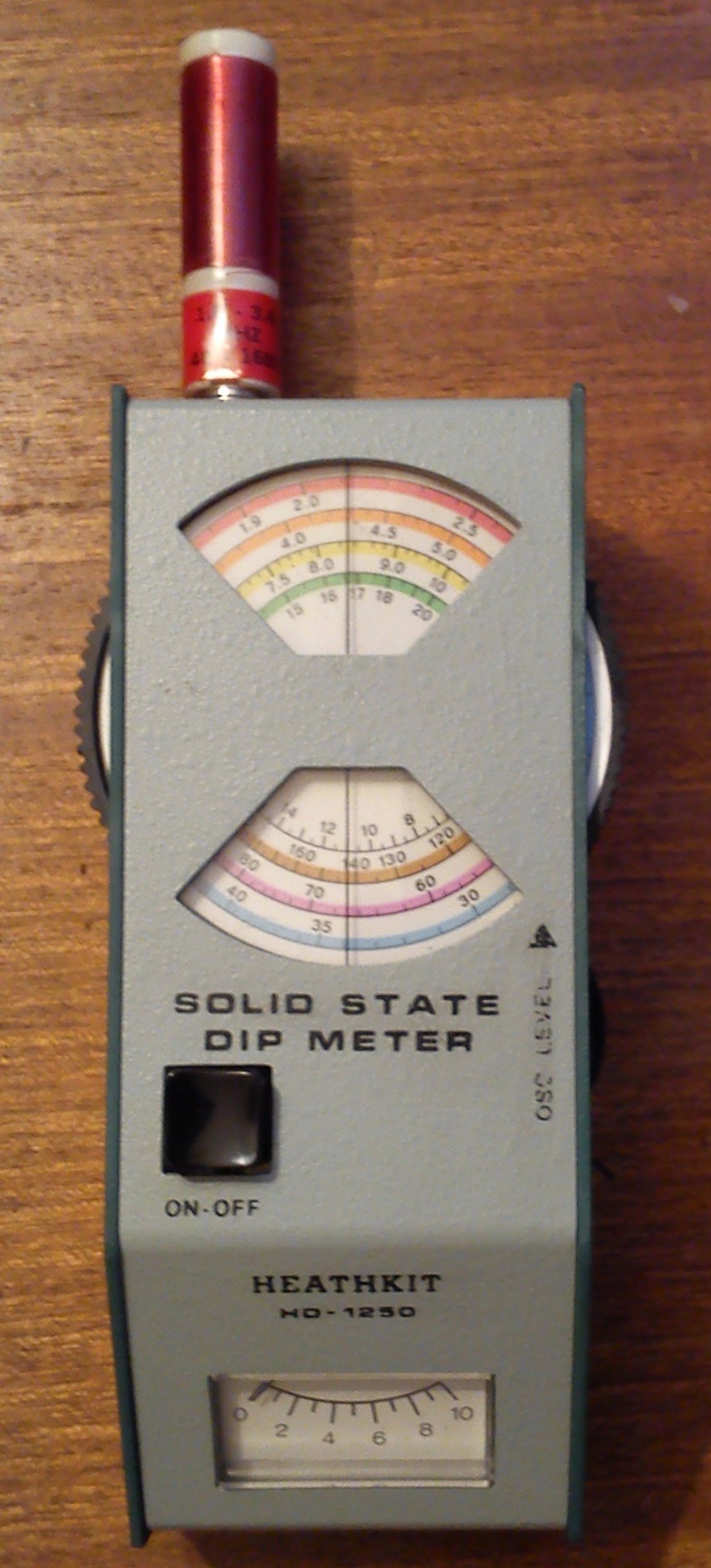 Figure 4 — The HD-1250 solid-state dip meter, the last of Heath's grid dippers, in the catalogue from 1975 to 1991. The dip meter was Heath's first ham product in 1952 and one of its last; like the Cantenna, …
