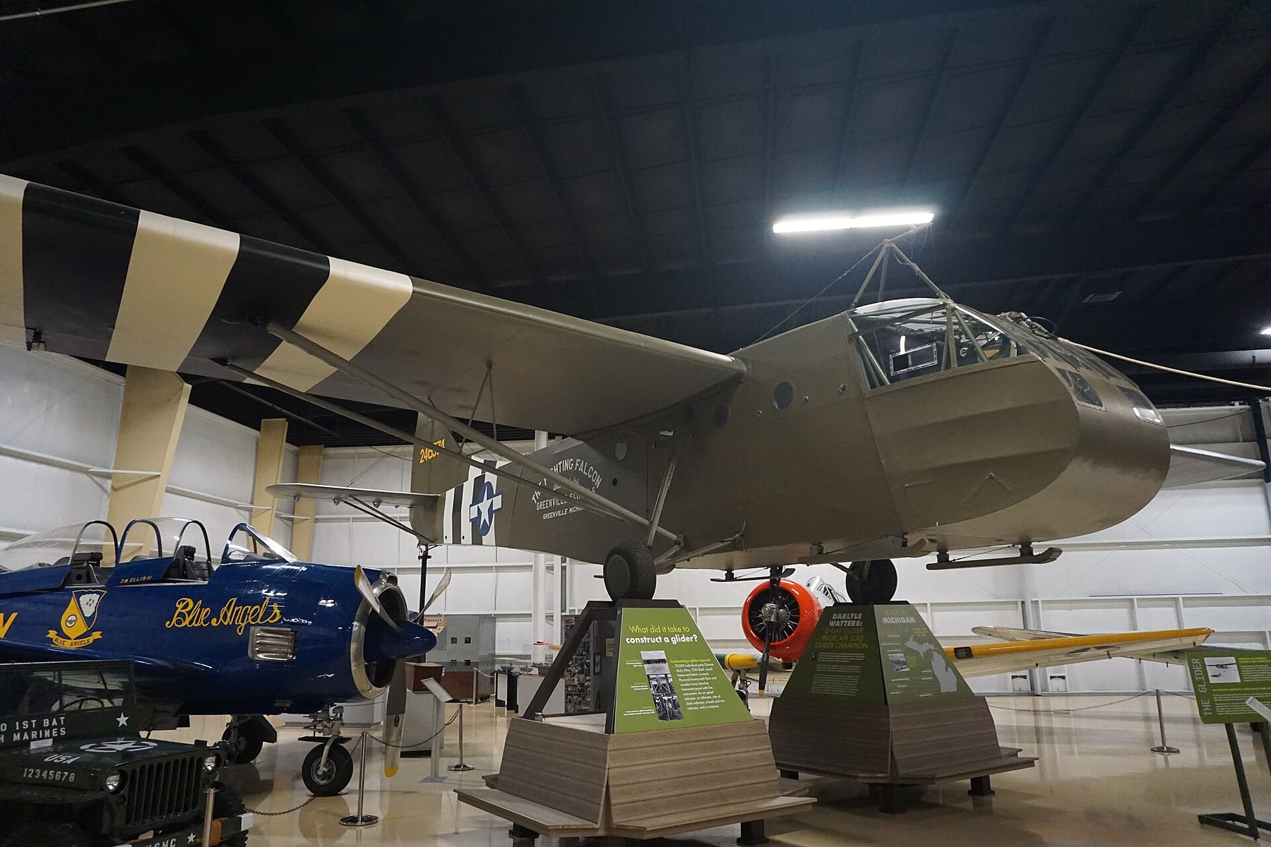 Figure 12 — A Waco CG-4A Hadrian cargo glider at the Air Zoo in Kalamazoo, Michigan. During the Second World War the Heath company pressed laminated-wood skids for this glider on a home-made hydraulic press; t…