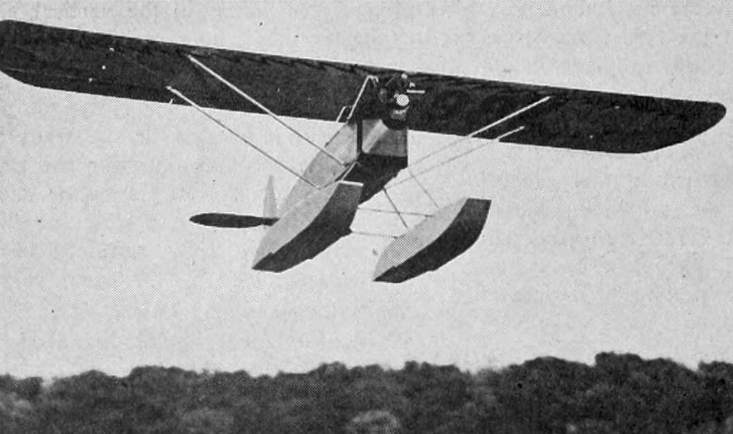 Figure 8 — The seaplane Parasol in flight, from Aero Digest, January 1930. Heath offered the float version on the same group-by-group instalment basis as the landplane; one surviving advertisement prices it a…