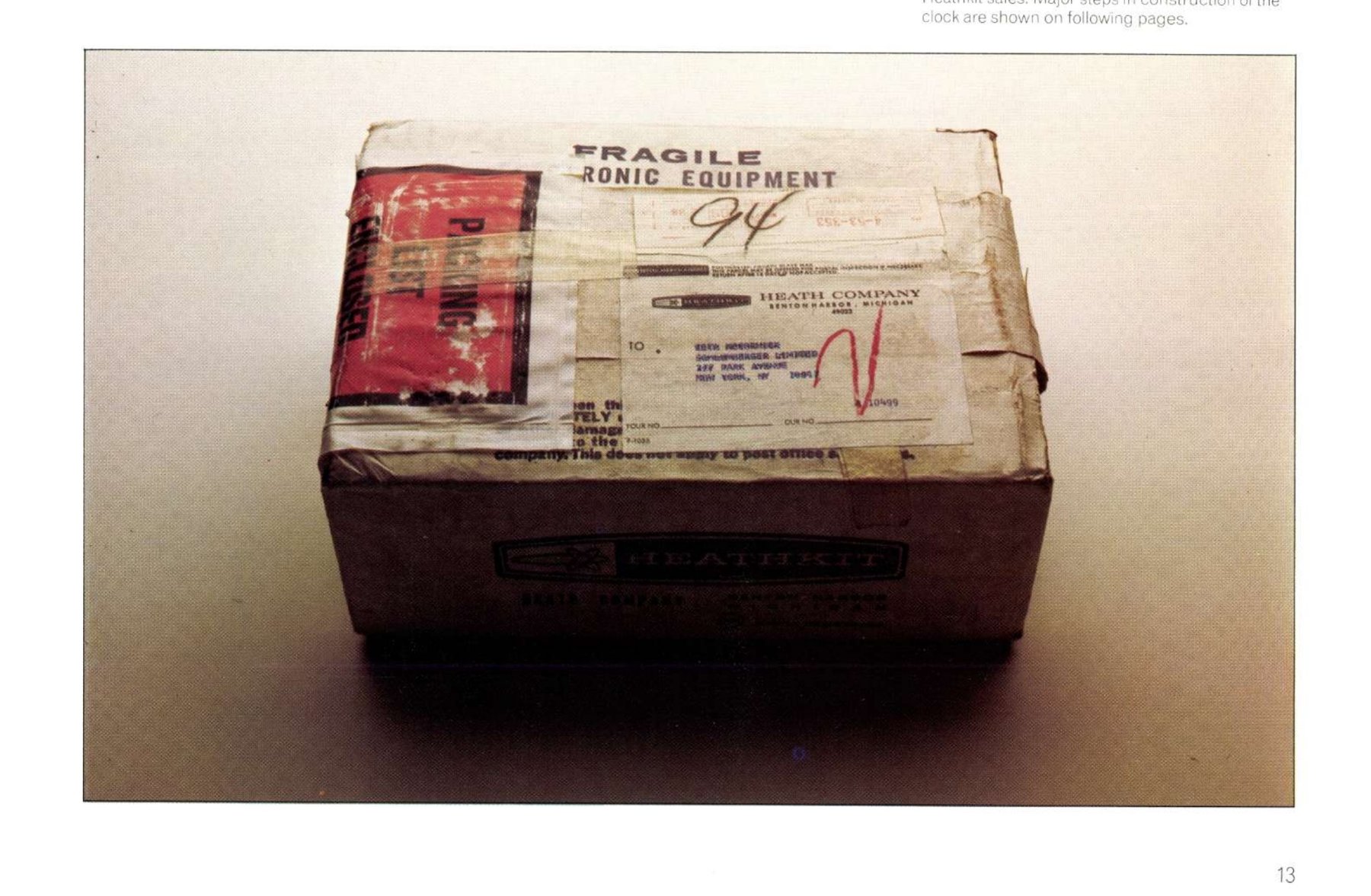 Figure 19 — A Heathkit electronic clock in its shipping carton, the first thing the customer saw. Schlumberger's 1972 report used this kit to show how a Heathkit was built, noting that mail order still account…