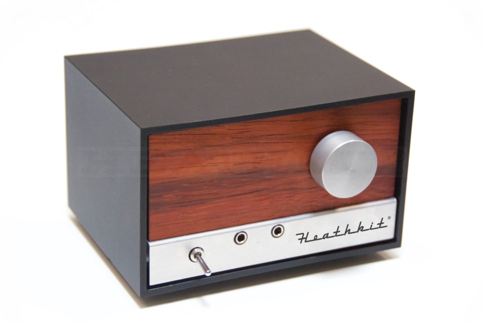 Figure 6 — The Explorer AM receiver, GR-152-BK (solder version), the first product of the restarted company (2015). The walnut side panels and silver trim deliberately echo the Heathkit clocks and radios of t…