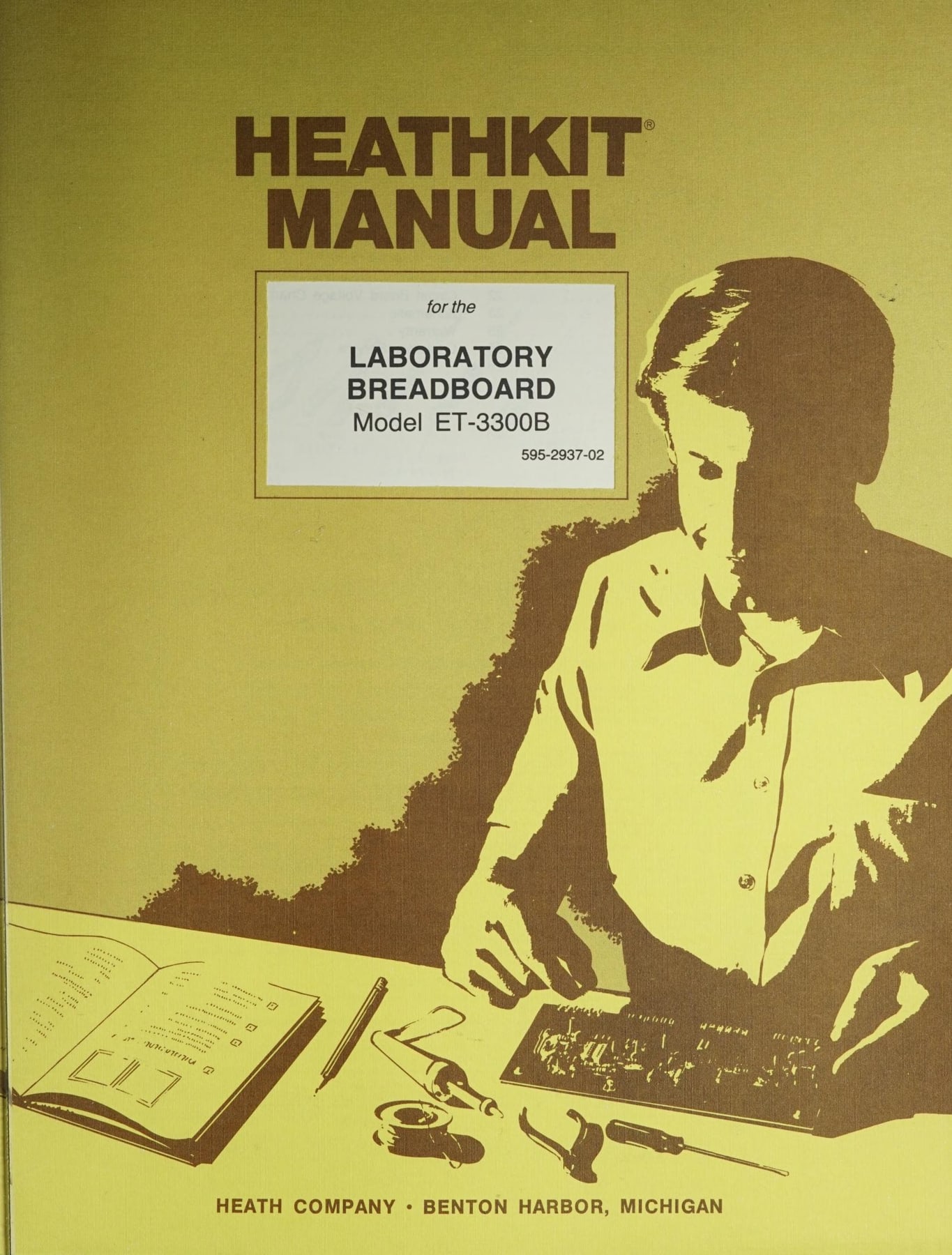 Figure 22 — The ET-3300B Laboratory Breadboard manual (1983): the 1980s Heathkit Manual cover, with a two-colour drawing of a student at work. The ET-series trainers linked the kit business to Heathkit Educati…