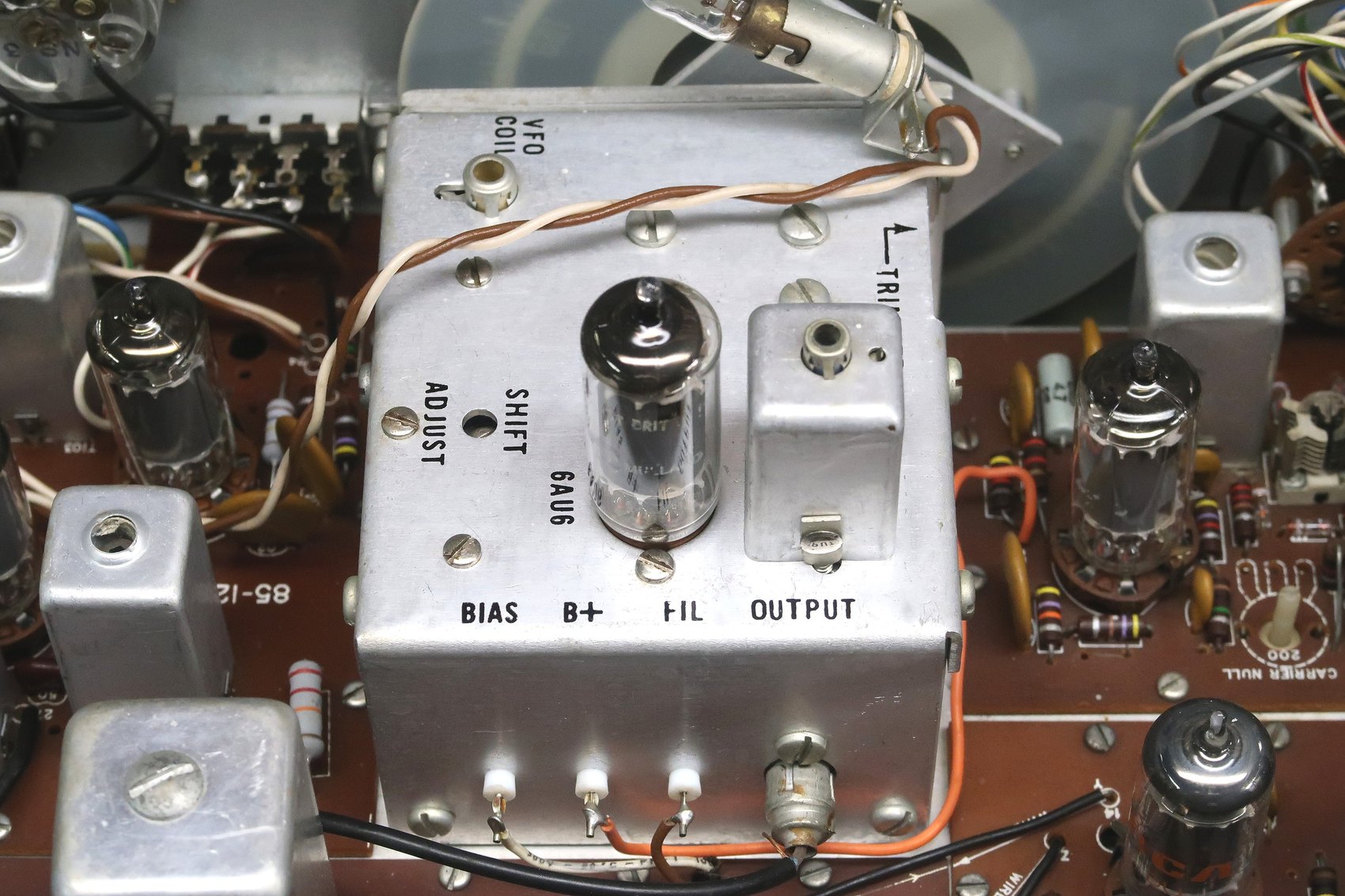 Figure 14 — The VFO in its shielded box: the MPF-105 and its coil L941 inside, the 6AU6 amplifier on top, and the BIAS, B+, FIL and OUTPUT terminals along the front edge. The temperature-compensating capacitor…