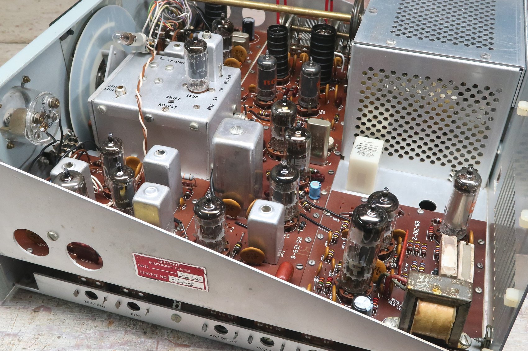 Figure 14 — Side view with the cabinet off, showing the VFO box, the board stack and the final cage in relation to one another. The layout is open by any standard and generously so by 1970 standards; it is the…