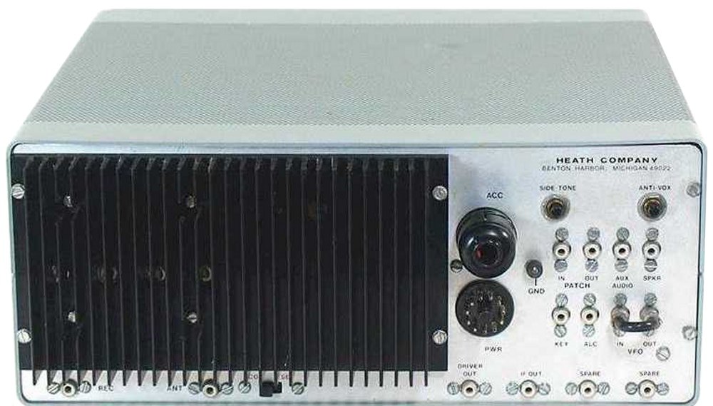 Figure 12 — The rear of an SB-104A: the finned heat sink of the power amplifier fills the left half. Right of it are the 11-pin accessory and power sockets, the SIDE TONE and ANTI-VOX controls, phono jacks for…